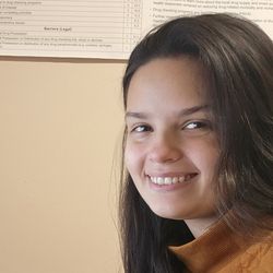 Gabrielle Riendeau sits in front of her computer.