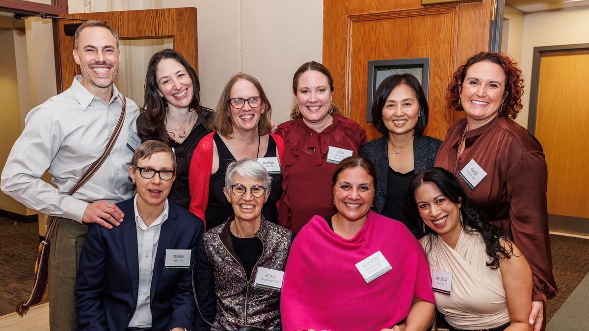People at the NESA reunion posing for a picture.