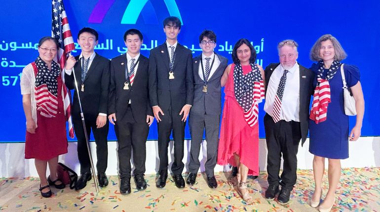 MCPHS Chemistry Professor Songwen Xie, first from left, coached Team USA to four gold medals at the 57th International Chemistry Olympiad (IChO) in Dubai.