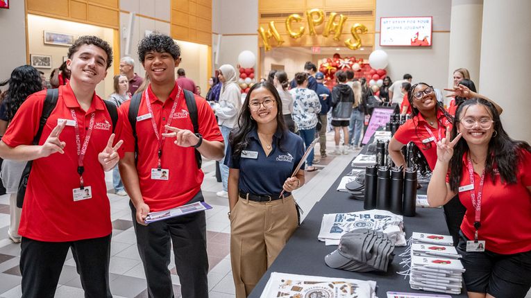 Students smile at MCPHS Orientation.