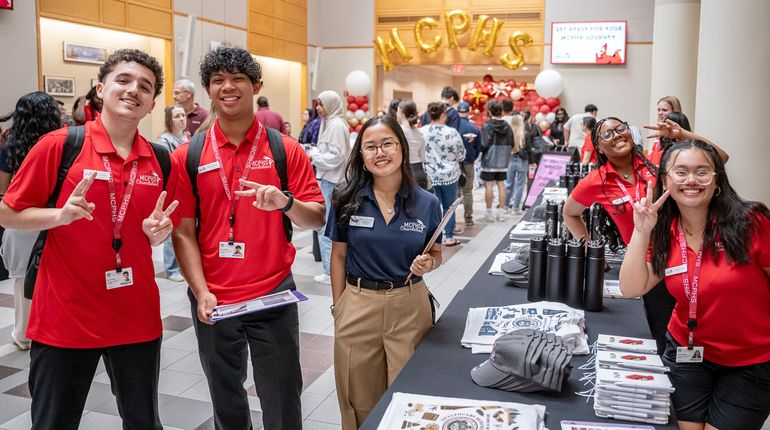 Students smile at MCPHS Orientation.