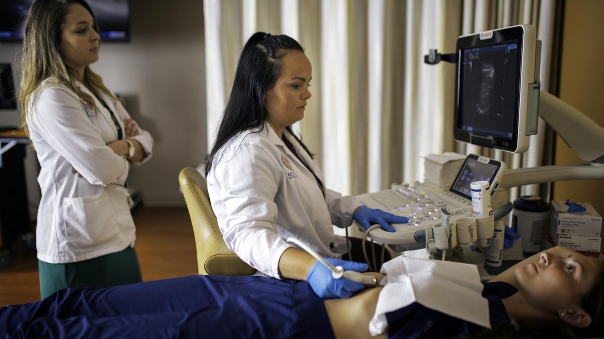 Diagnostic Medical Sonography student in a clinical setting.